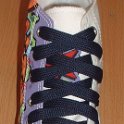 Fat (Wide) Navy Blue Shoelaces on Chucks  White graffiti high top with wide navy blue laces.