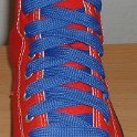 Fat (Wide) Royal Blue Shoelaces on Chucks  Red high top with wide royal blue laces.
