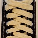 Fat (Wide) Natural White (Vanilla) Shoelaces on Chucks  Wide natural white shoelaces on a black low cut chuck.