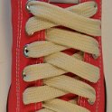 Fat (Wide) Natural White (Vanilla) Shoelaces on Chucks  Wide natural white shoelaces on a red low cut chuck.