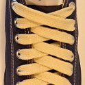 Fat (Wide) Natural White (Vanilla) Shoelaces on Chucks  Wide natural white shoelaces on a navy blue low cut chuck.