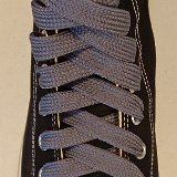 Fat (Wide) Metal Grey Shoelaces on Chucks  Black high top with fat metal grey shoelaces.