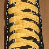 Fat (Wide) Gold Shoelaces on Chucks  Black high top with fat gold laces.