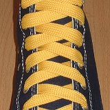 Fat (Wide) Gold Shoelaces on Chucks  Navy blue high top with fat gold shoelaces.