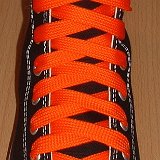 Fat (Wide) Orange Shoelaces on Chucks  Black high top with fat orange shoelaces.