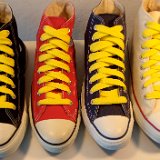 Fat (Wide) Yellow Shoelaces on Chucks  Core high tops with yellow wide shoelaces.