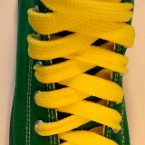 Fat (Wide) Yellow Shoelaces on Chucks  Green high top with yellow wide shoelaces.