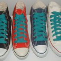 Fat (Wide) Teal Shoelaces on Chucks  Core color high tops with fat teal shoelaces.