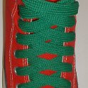 Fat (Wide) Kelly Green Shoelaces on Chucks  Red high top with Kelly green wide shoelaces.