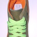 Fat (Wide) Neon Lime Shoelaces on Chucks  Olive green and orange roll down high top chuck with fat neon lime shoelaces.