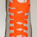 Fat (Wide) Neon Orange Shoelaces on Chucks  Optical white high top chuck with fat neon orange shoelaces.