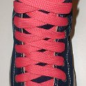 Fat (Wide) Neon Pink Shoelaces on Chucks  Navy blue high top chuck with fat neon pink shoelaces.