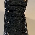 Extra Fat Shoelaces on High Top Chucks  Black high top with black extra fat shoelaces.