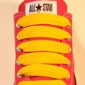 Extra Fat Laces on Low Top Chucks  Red low top chuck with golden yellow extra fat shoelaces.
