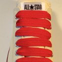Extra Fat Laces on Low Top Chucks  Unbleached white low top chuck with red extra fat shoelaces.