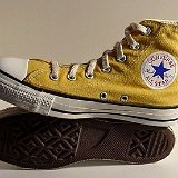 Yellow Chucks  Inside patch and sole views of mustard high top chucks.