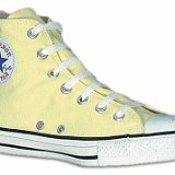 Yellow Chucks  Angled side view of a pale yellow left high top.