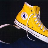 Yellow Chucks  Inside patch and sole views of yellow high top chucks.