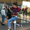 Zendaya  Zendaya wears black high top chucks while showing off her hilarious personality by spinning on a pole.